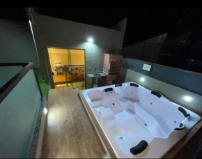 Flat com jacuzzi delux para 7 pessoas